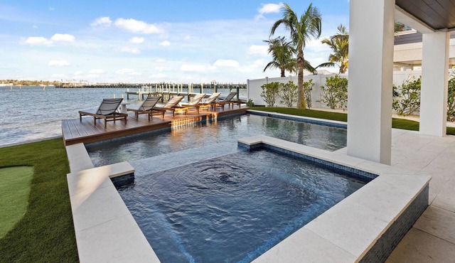 Waterfront Luxury Home with Pool and Spa, Golf Cart, and beach Bikes included!