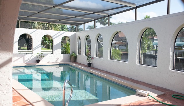 Waterfront luxury 4 bed 4 bath with large heated pool & dock
