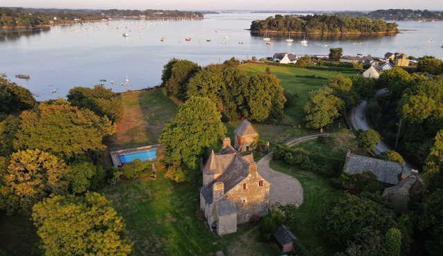 Waterfront manor house with heated pool