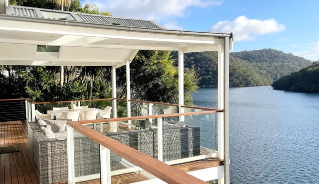 Waterfront modern property w/boat, outside hot tub, SUPs, kayaks, fishing equip