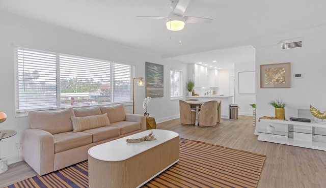 Waterfront Oasis 2BR/2BA with Pool, Gym, Balcony & Parking