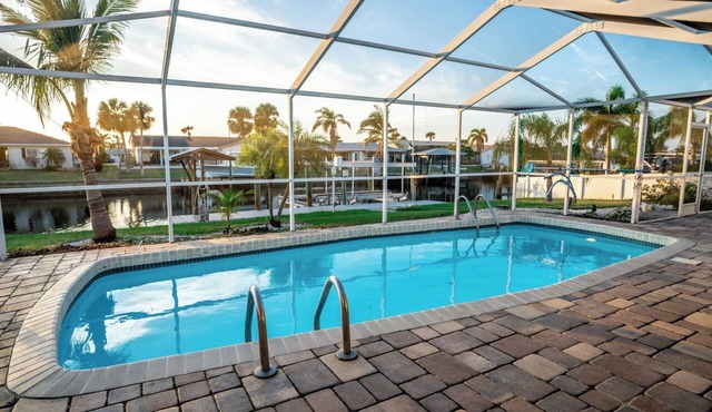 Waterfront Oasis with Pool, Spa + Lanai Bar - Simply Blessed