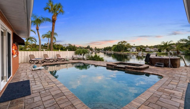 Waterfront Oasis w/Pool, Spa, Boat & Jet ski Dock, Game Room & Outdoor Kitchen