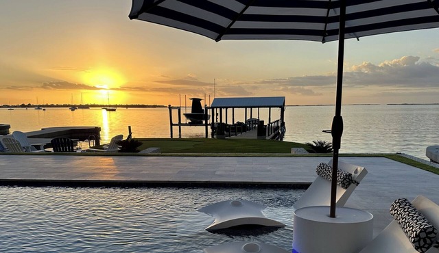Waterfront Oasis with Stunning Sunsets and a Fully Renovated Backyard