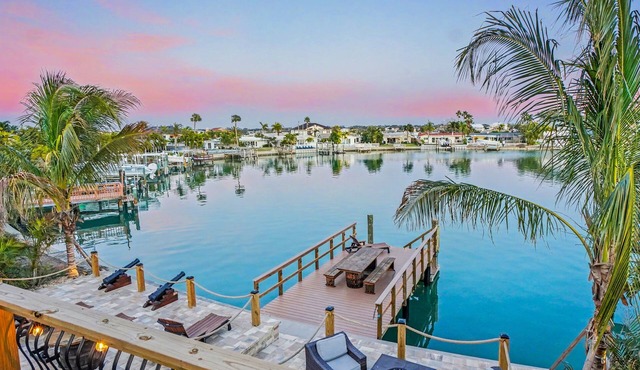 Waterfront Pirate House with Pool & 2 Golf Carts