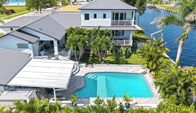 Waterfront Paradise with heated saltwater pool and amazing views gulf access