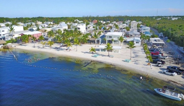 Waterfront paradise with private community beach within walking distance.
