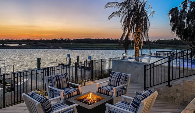 Waterfront paradise with private pool, dock, poolside TV & multi-TV game room