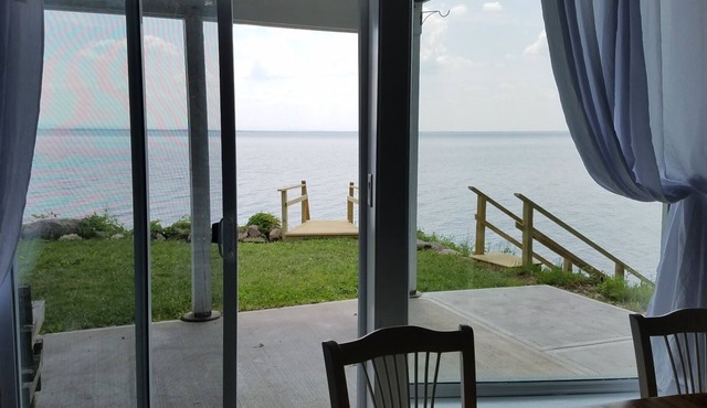 Waterfront pet friendly retreat located on Oneida Lake in Cleveland, NY.