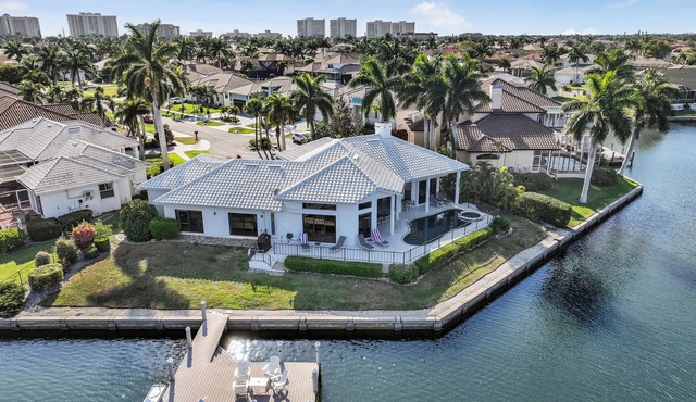 Waterfront property with stunning views within walking distance to the beach.