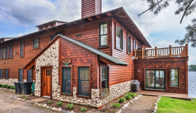 Waterfront resort condo with private dock, 4-season porch, & seasonal pool