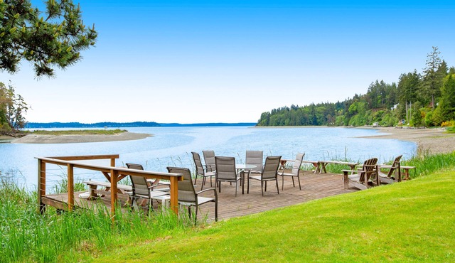 Waterfront retreat with private beach, firepit, kayaks/SUP, EV charger & grill