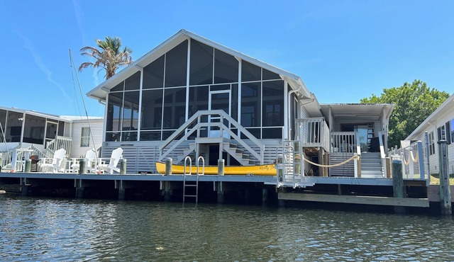 Waterfront retreat with boat dock & private ramp right off the river