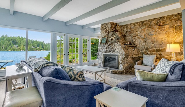 Waterfront retreat with lake views & private hot tub