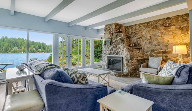 Waterfront retreat with lake views & private hot tub