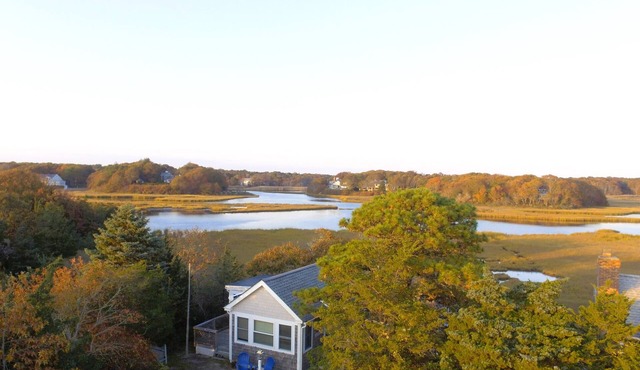 Waterfront! Riverfront delight. 2 BR, private, decks. Steps to Craigville Beach