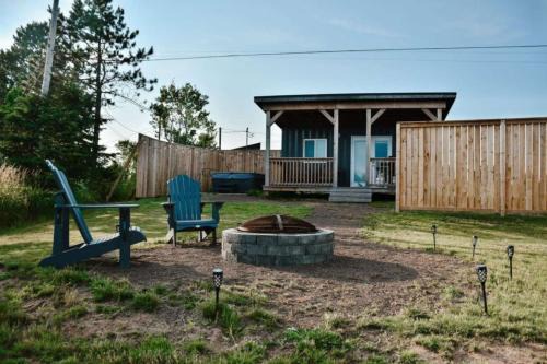 Waterfront Seacan Retreat with Hot Tub