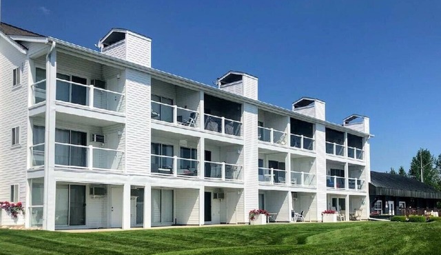 Waterfront Setting w/Top-Floor Views Overlooking Lake Charlevoix