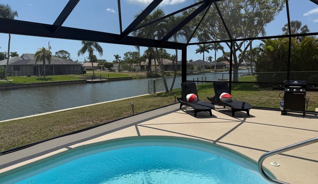 Waterfront Southern Exposure 3/2 Pool home on a Wide Fresh Water Canal!