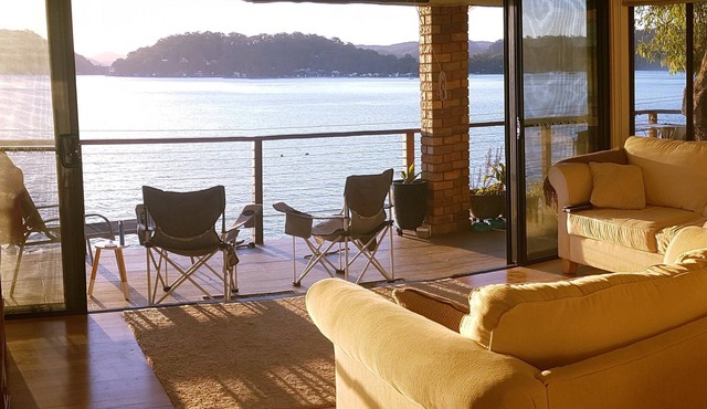 Waterfront! Stunning boat access only home. Deep water jetty. Sunset views