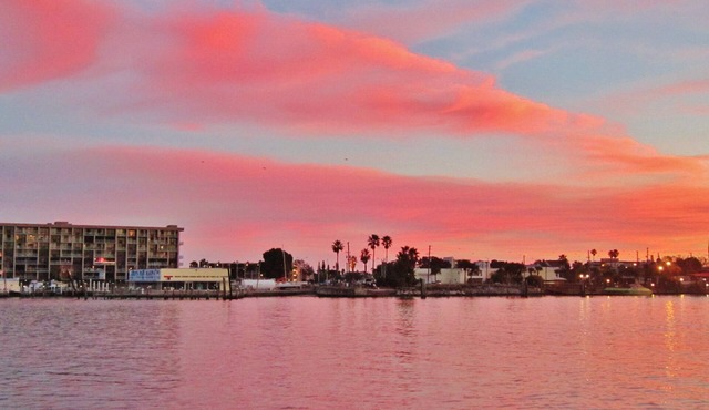 Waterfront Treasure Island Apartment w/Private Patio, Dock & John’s Pass Nearby