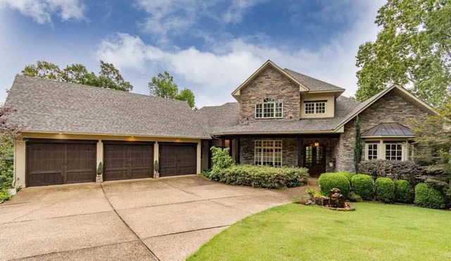 Waterfront 5000 sq. ft. on cove, boat dock & 2 large decks, Media & Game Room.