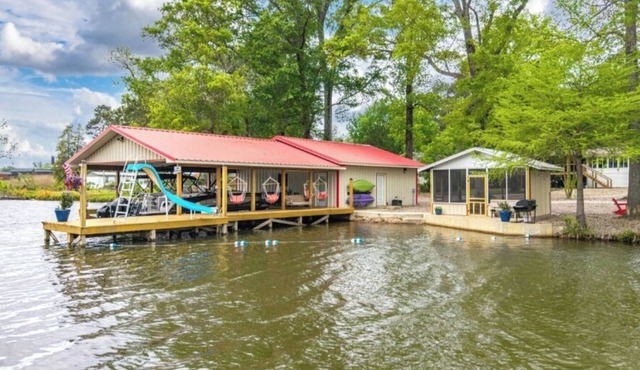Waterfront, w/covered boat slip, screened gazebo, kayaks, slide w/swim area