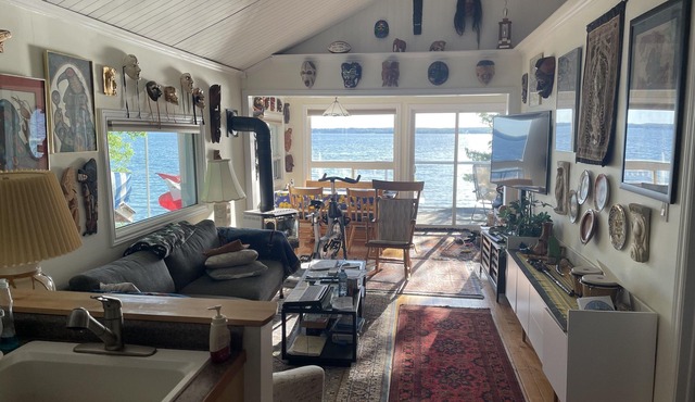 Waterfront with sunsets and sand bottom lake