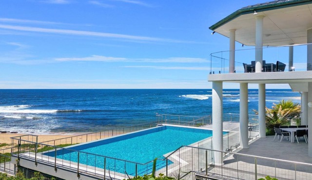 WAVES AT BLUE BAY | Beachfront , Pool | Accom Property