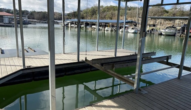WE HAVE WATER with boat dock AND ramp! EV Charger in garage!