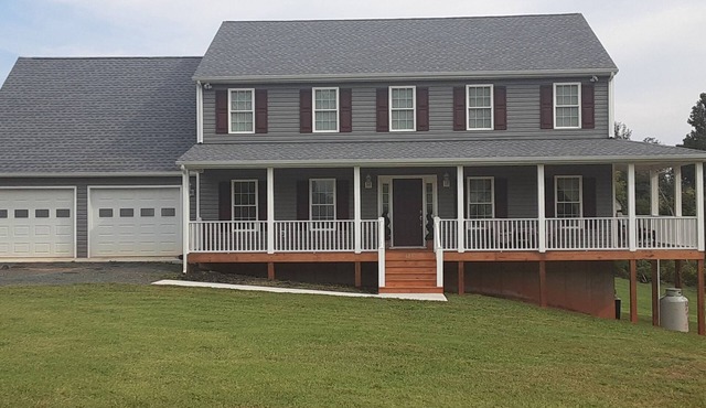 Welcome Home! New luxurious home awaits - large family room w/fireplace.