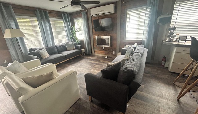 Welcome to our modern cozy two bedroom cottage located in Pointe-du-Chene