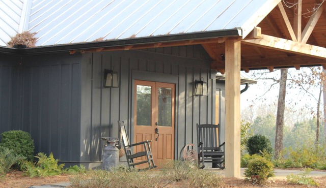 Welcome to our peaceful rustic farmhouse retreat, nestled on private acreage.