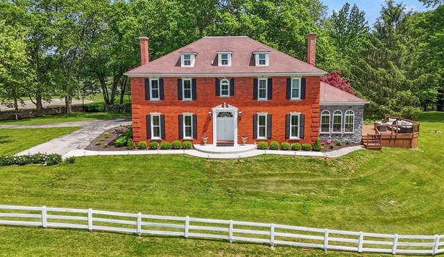 Welcome to Stillmeadow Farm, a grand Georgian-style home nestled on 135 acres in Frankfort, KY
