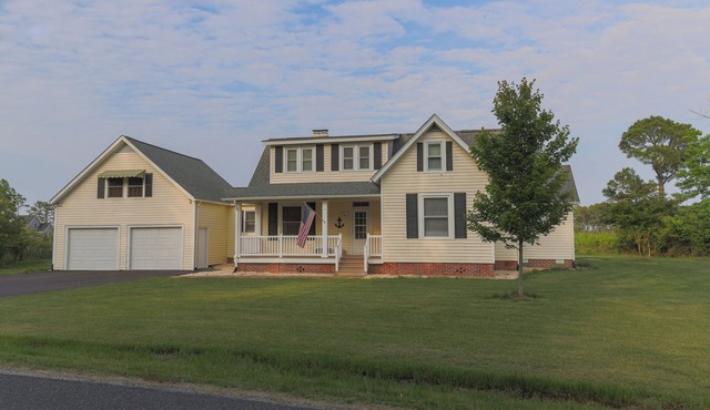 Welcome to The Cove - a spacious 6-bedroom house located in charming White Stone