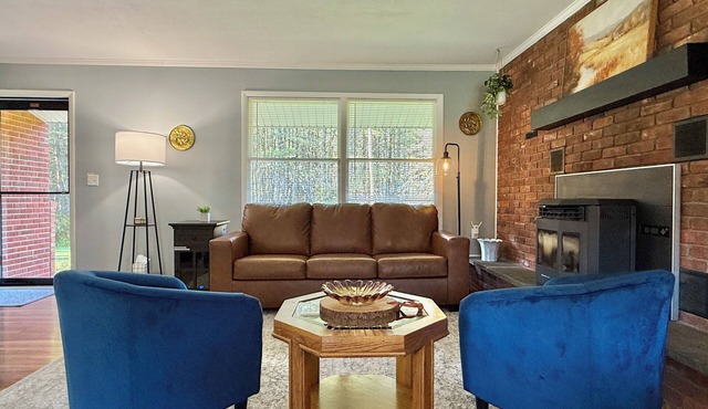 Welcome to The Landing Pad, only 7-min drive to ASV. A warm and inviting retreat designed by a family of pilots who know the value of rest between adventures. Subtle aviation touches give this home a unique personality.