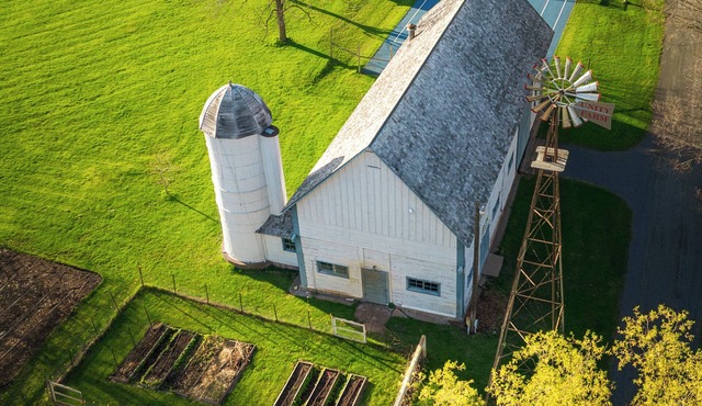 Welcome to Unity Farm; Three private cottages set across restored prairie and forest along the St. Croix River, with a barn and tennis courts. Designed for group retreats and family gatherings, with trails, open space, and room to slow down.