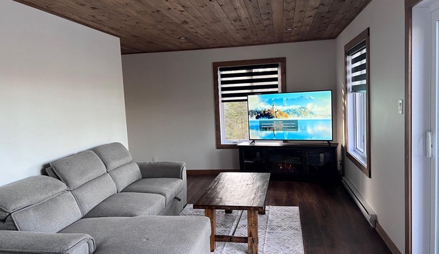 Welcome to your haven of peace, a magnificent chalet nestled in the heart of nature.