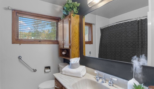 Welcoming 2-bedroom home with large deck and central location.