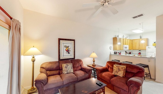 Welcoming ground-floor condo with patio, pool, fitness center, sauna, & hot tub