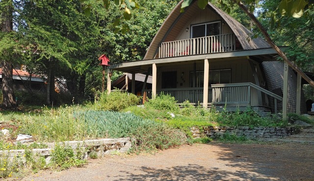 Welcoming home with large decks & wood stove - located in heart of McCall