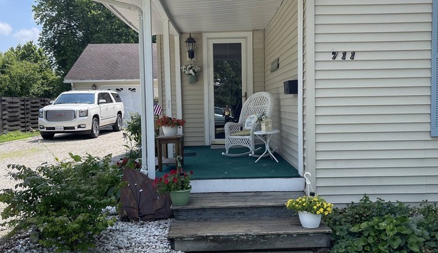 Welcoming hometown retreat with pool, hot tub and fenced in yard.