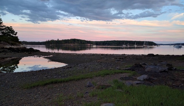 Welcoming vacation home offers a private setting on the water's edge