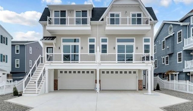 Well Crafted Townhouse featuring 6 bedrooms, 4.5 bathrooms, a Bonus room and a Heated Pool.