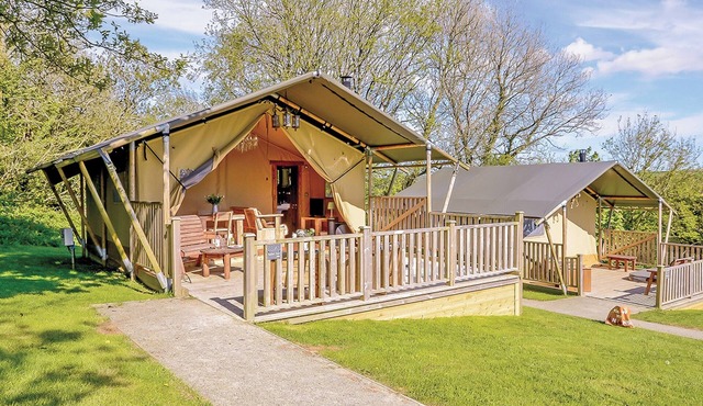 Well equipped bespoke safari tent with four poster double.