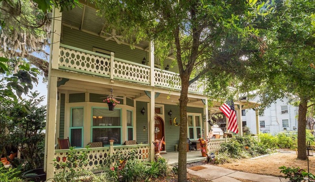 West Stella Lake House with Outdoor Pool Table & Fireplace by RedAwning