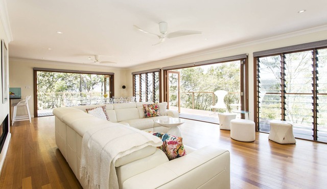 Whale Beach Modern 4 bedroom, 4 bath secluded home, ocean views in bush setting.