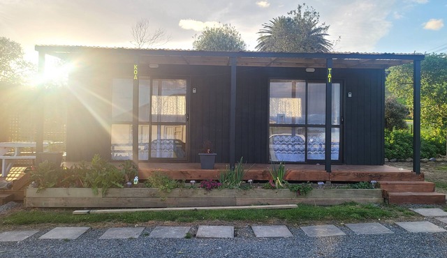 Whare Koa awaits to provide that relaxing ambience for you with all day sun!