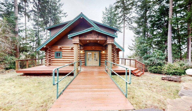 Whimsical island stay with Sound view, grill, wrap-around balcony, & game room