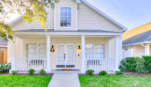 Whimsical sunlit retreat with private pool, patio, & game room - close to parks